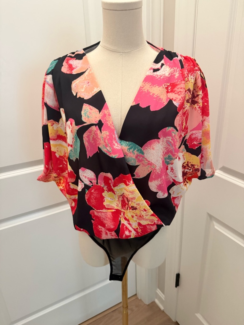 Flying Tomato Black Floral Wrap Bodysuit with Pink and Yellow Blooms